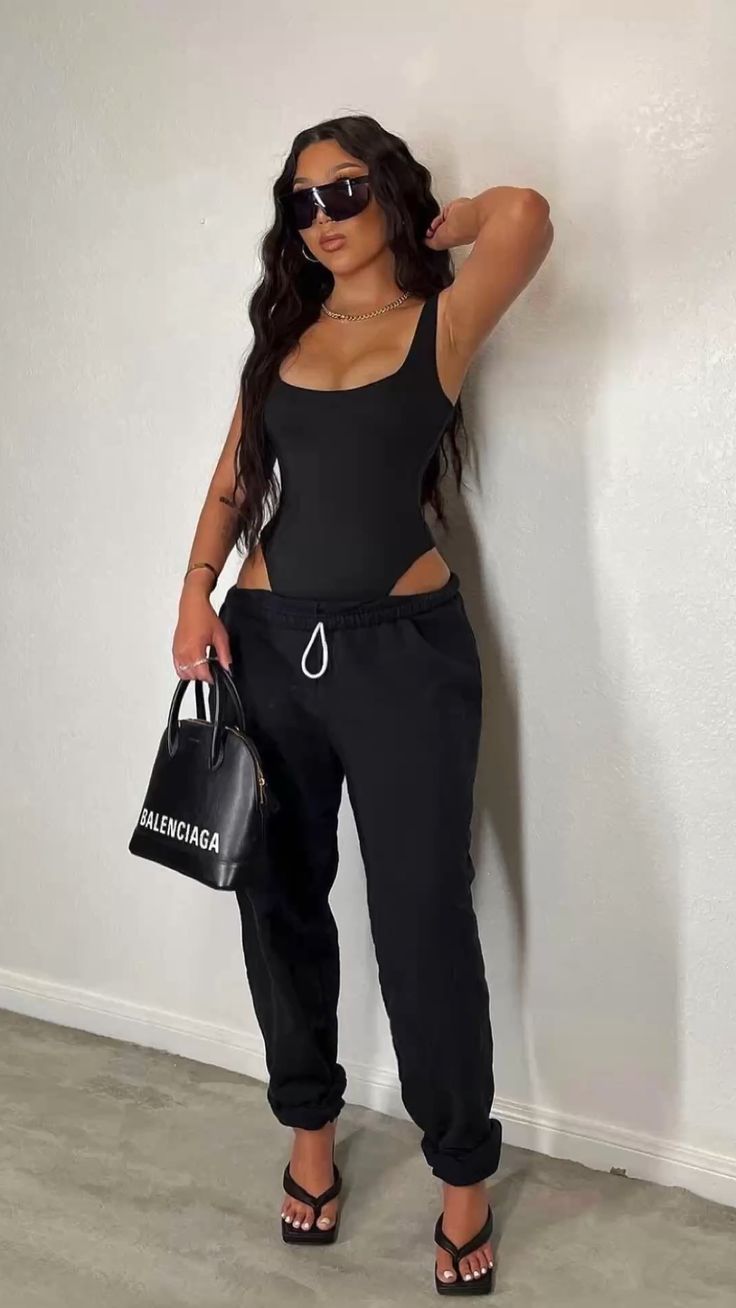 Black Bodysuit with Black Sweatpants and Heels